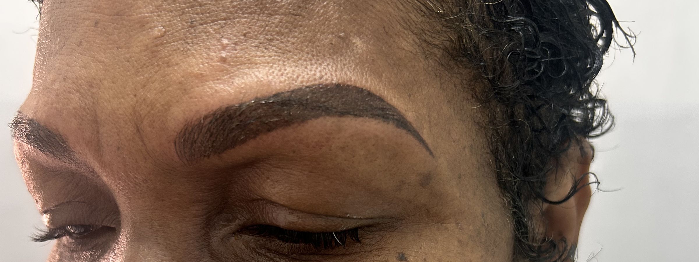 A client with healed microshaded brows