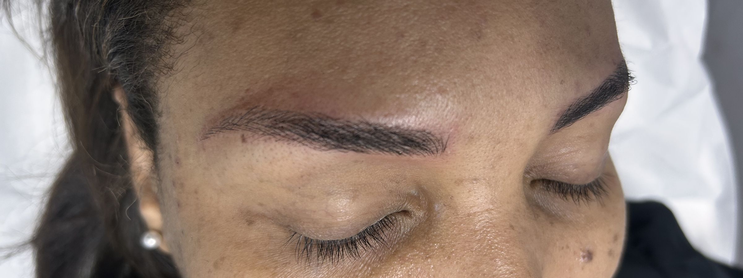 Client brows after microblading at Ellimak Aesthetics