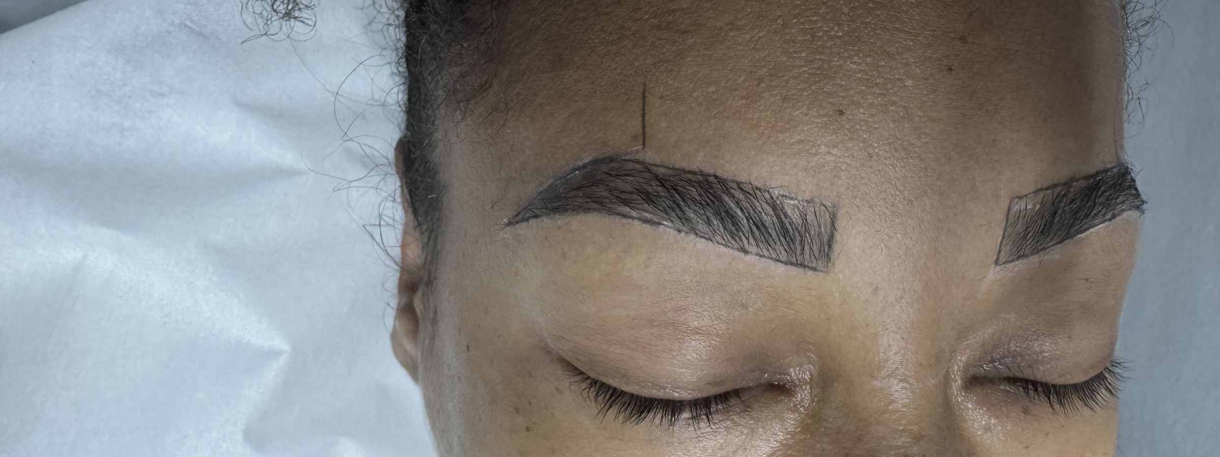 Brows mapped and drawn on a client before microshading